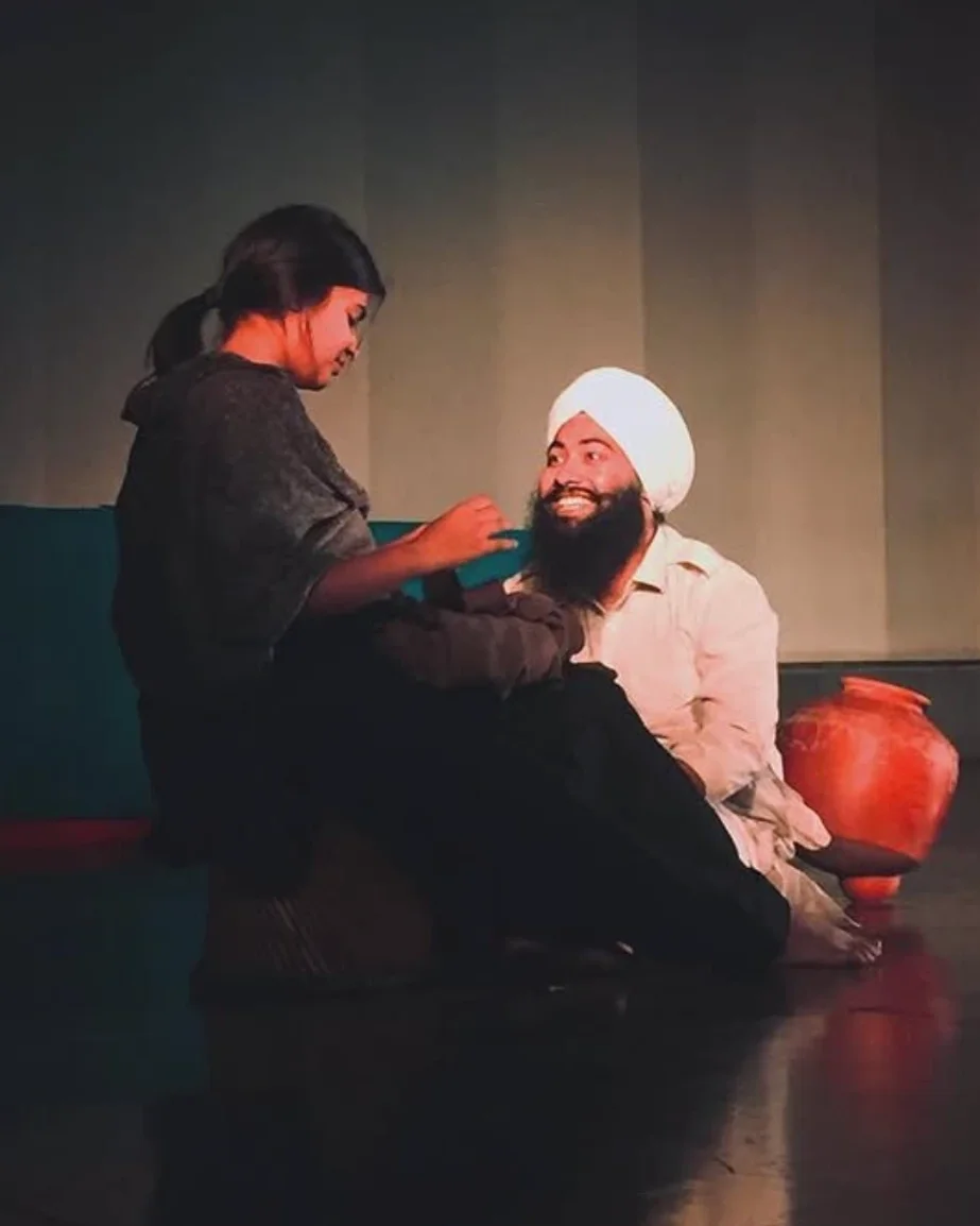 Ira performing in a stage play