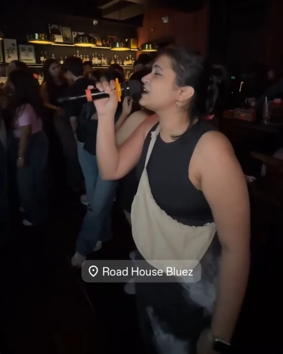 Ira singing karaoke at Road House Bluez