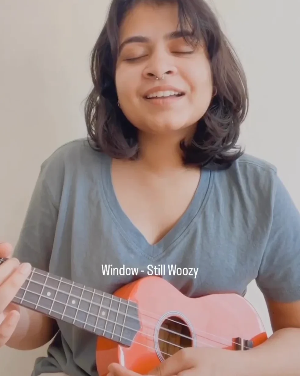 Ira singing Window by Still Woozy on the ukulele